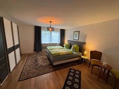 Ein Bett oder Betten in einem Zimmer der Unterkunft Kleine Bergzeit