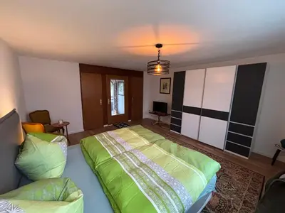 Ein Bett oder Betten in einem Zimmer der Unterkunft Kleine Bergzeit