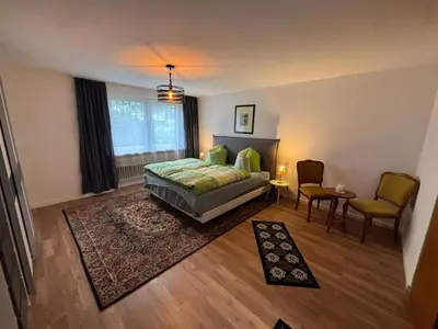 Ein Bett oder Betten in einem Zimmer der Unterkunft Kleine Bergzeit