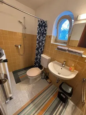 Ein Badezimmer in der Unterkunft Kleine Bergzeit