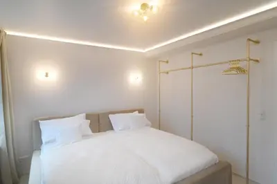 Ein Bett oder Betten in einem Zimmer der Unterkunft Sams Living Athen - Munich City