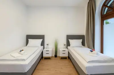 Ein Bett oder Betten in einem Zimmer der Unterkunft SMS Homes I Auszeit in Kaufbeuren Zentrum