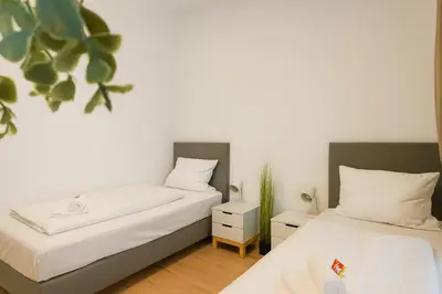 Ein Bett oder Betten in einem Zimmer der Unterkunft SMS Homes I Auszeit in Kaufbeuren Zentrum