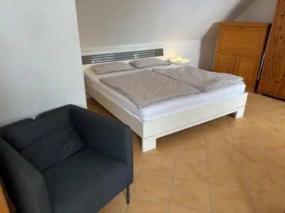 Ein Bett oder Betten in einem Zimmer der Unterkunft Ferienwohnung mit Küche und Bad