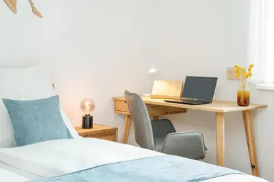 Ein Bett oder Betten in einem Zimmer der Unterkunft Ferienwohnung Mondscheinbauer Übersee am Chiemsee