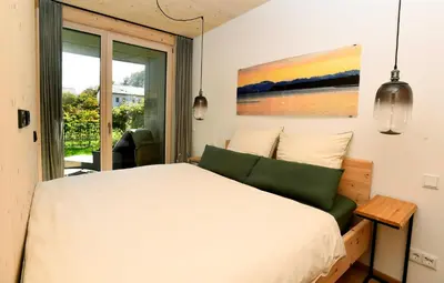 Ein Bett oder Betten in einem Zimmer der Unterkunft Das SeeQuartier - Ein Ort zum Genießen - Luxuriös und BrandNEU