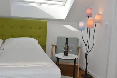 Ein Bett oder Betten in einem Zimmer der Unterkunft Zentral Apartment