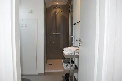 Ein Badezimmer in der Unterkunft Zentral Apartment