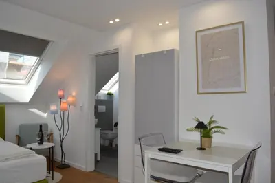 Ein Bett oder Betten in einem Zimmer der Unterkunft Zentral Apartment