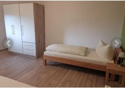 Ein Bett oder Betten in einem Zimmer der Unterkunft Haus für Monteure und Studenten