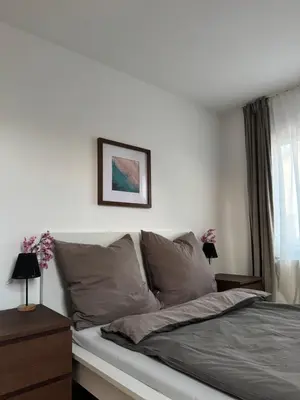 Ein Bett oder Betten in einem Zimmer der Unterkunft Casa Bavaria Apartments