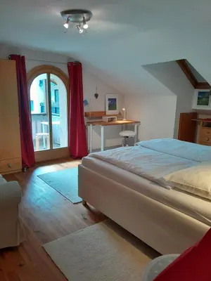 Ein Bett oder Betten in einem Zimmer der Unterkunft Ferienhaus Alpenpanorama