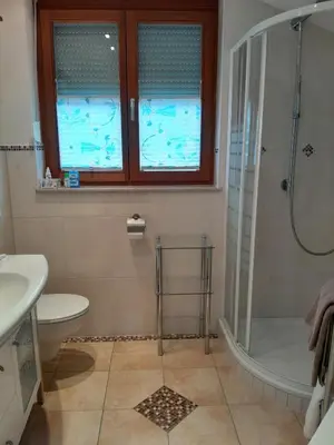 Ein Badezimmer in der Unterkunft Ferienhaus Alpenpanorama
