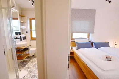 Ein Bett oder Betten in einem Zimmer der Unterkunft ChiemseeGlück