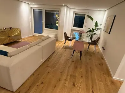 Ein Sitzbereich in der Unterkunft Modern apartment with terrace in Solln