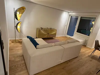 Ein Sitzbereich in der Unterkunft Modern apartment with terrace in Solln