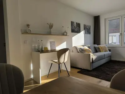 Ein Sitzbereich in der Unterkunft New spacious luxury apartment at Rathaushausplatz