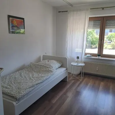 Ein Bett oder Betten in einem Zimmer der Unterkunft Ferienwohnung Friedlandeck