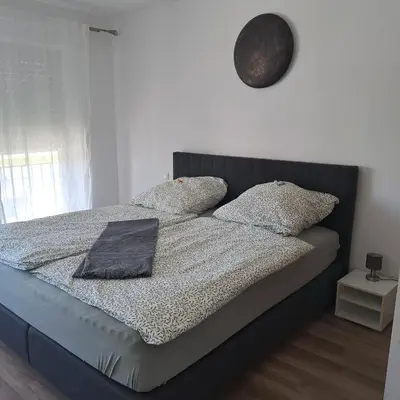 Ein Bett oder Betten in einem Zimmer der Unterkunft Ferienwohnung Friedlandeck