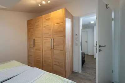Ein Bett oder Betten in einem Zimmer der Unterkunft Ferienwohnung am Luegsteinsee