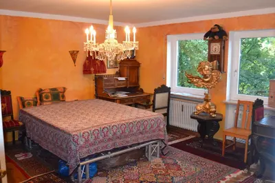 Ein Bett oder Betten in einem Zimmer der Unterkunft Oktoberfest 5min