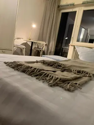 Ein Bett oder Betten in einem Zimmer der Unterkunft Oktoberfest