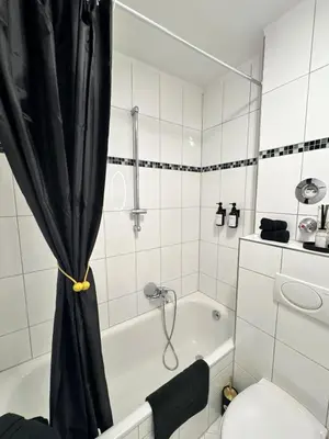 Ein Badezimmer in der Unterkunft Modern City Apartment 3