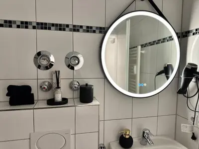 Ein Badezimmer in der Unterkunft Modern City Apartment 3