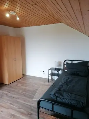 Ein Bett oder Betten in einem Zimmer der Unterkunft Wohnung am See