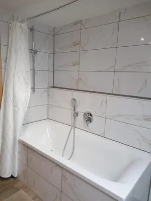 Ein Badezimmer in der Unterkunft Wohnung am See