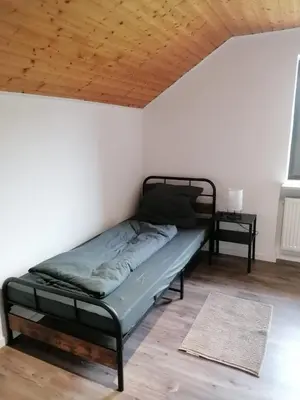 Ein Bett oder Betten in einem Zimmer der Unterkunft Wohnung am See