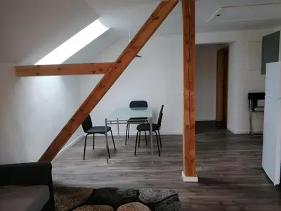 Ein Sitzbereich in der Unterkunft Wohnung am See