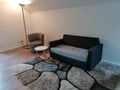 Ein Sitzbereich in der Unterkunft Wohnung am See