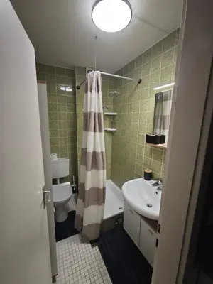 Ein Badezimmer in der Unterkunft Einzimmerappartment München Solln