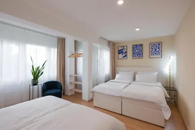 Ein Bett oder Betten in einem Zimmer der Unterkunft Valemi NEW Premium & Huge, 2Bathroom, SuperCentral, FreeParking, up to 8-16 Guests