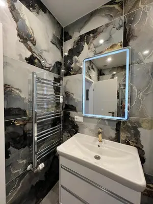 Ein Badezimmer in der Unterkunft Ferienwohnung Schneeglöckchen