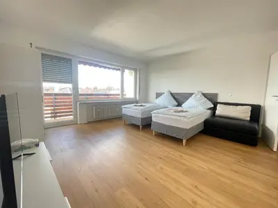 Ein Bett oder Betten in einem Zimmer der Unterkunft Miracle 6 Betts Apart mit Parkplatz