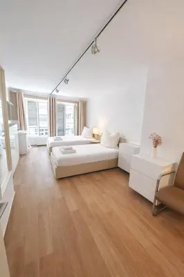 Ein Bett oder Betten in einem Zimmer der Unterkunft Munich Premium Guesthouse