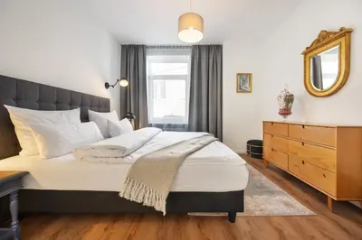 Ein Bett oder Betten in einem Zimmer der Unterkunft Munich Furnished Apartments