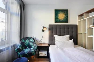 Ein Bett oder Betten in einem Zimmer der Unterkunft Munich Furnished Apartments