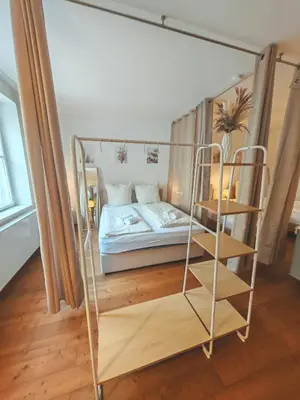 Ein Bett oder Betten in einem Zimmer der Unterkunft Munique City Residence Go