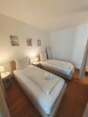 Ein Bett oder Betten in einem Zimmer der Unterkunft Munique City Residence Go