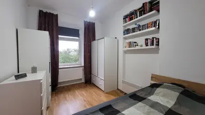 Ein Bett oder Betten in einem Zimmer der Unterkunft Central Tower Magic View