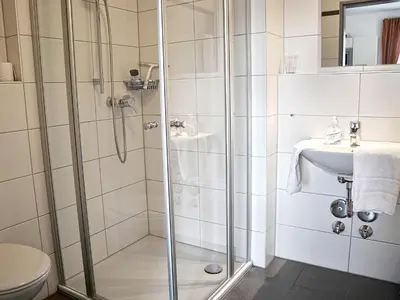 Ein Badezimmer in der Unterkunft Apparthotel Ampertal