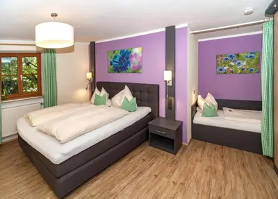 Ein Bett oder Betten in einem Zimmer der Unterkunft Ferienhof Seethaler Wörthsee