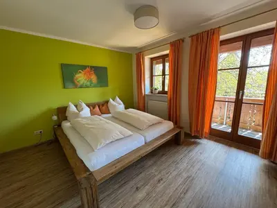 Ein Bett oder Betten in einem Zimmer der Unterkunft Ferienhof Seethaler Wörthsee