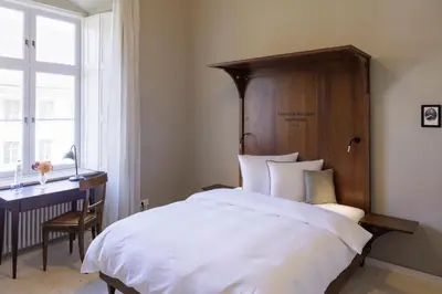 Ein Bett oder Betten in einem Zimmer der Unterkunft Hotel Josef im Kloster Beuerberg
