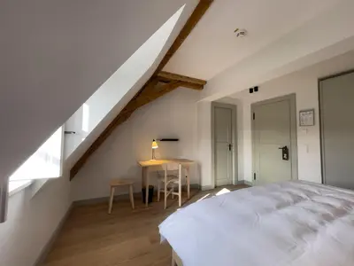 Ein Bett oder Betten in einem Zimmer der Unterkunft Hotel Josef im Kloster Beuerberg