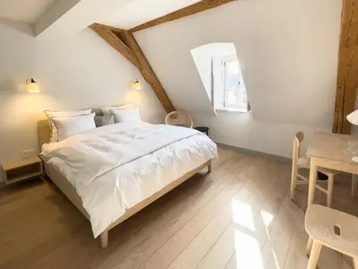 Ein Bett oder Betten in einem Zimmer der Unterkunft Hotel Josef im Kloster Beuerberg