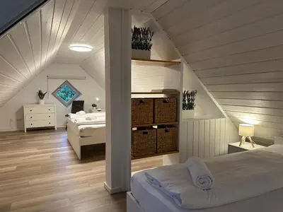 Ein Bett oder Betten in einem Zimmer der Unterkunft Grand Suite - Perfekt für 6-8! Parken Flughafen